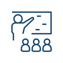 Icon of a person presenting at a board to an audience of three people.