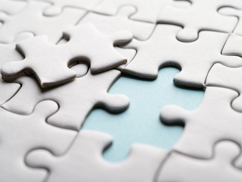 Puzzle piece with one center piece pulled out